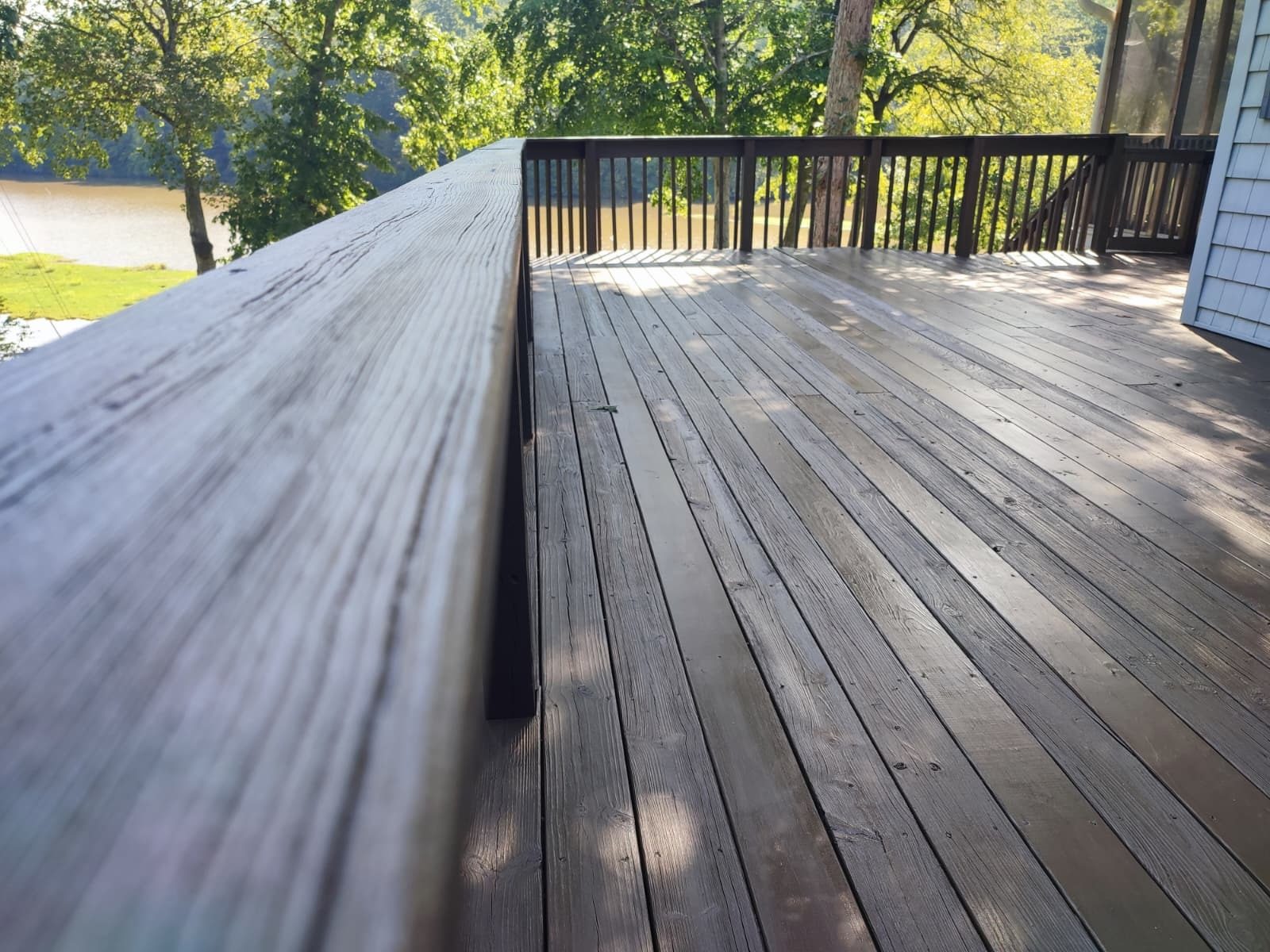 Deck boards finished in a dark semi-transparent stain