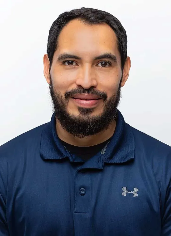 Jose Roca, owner of Roca's Painters, in a navy polo