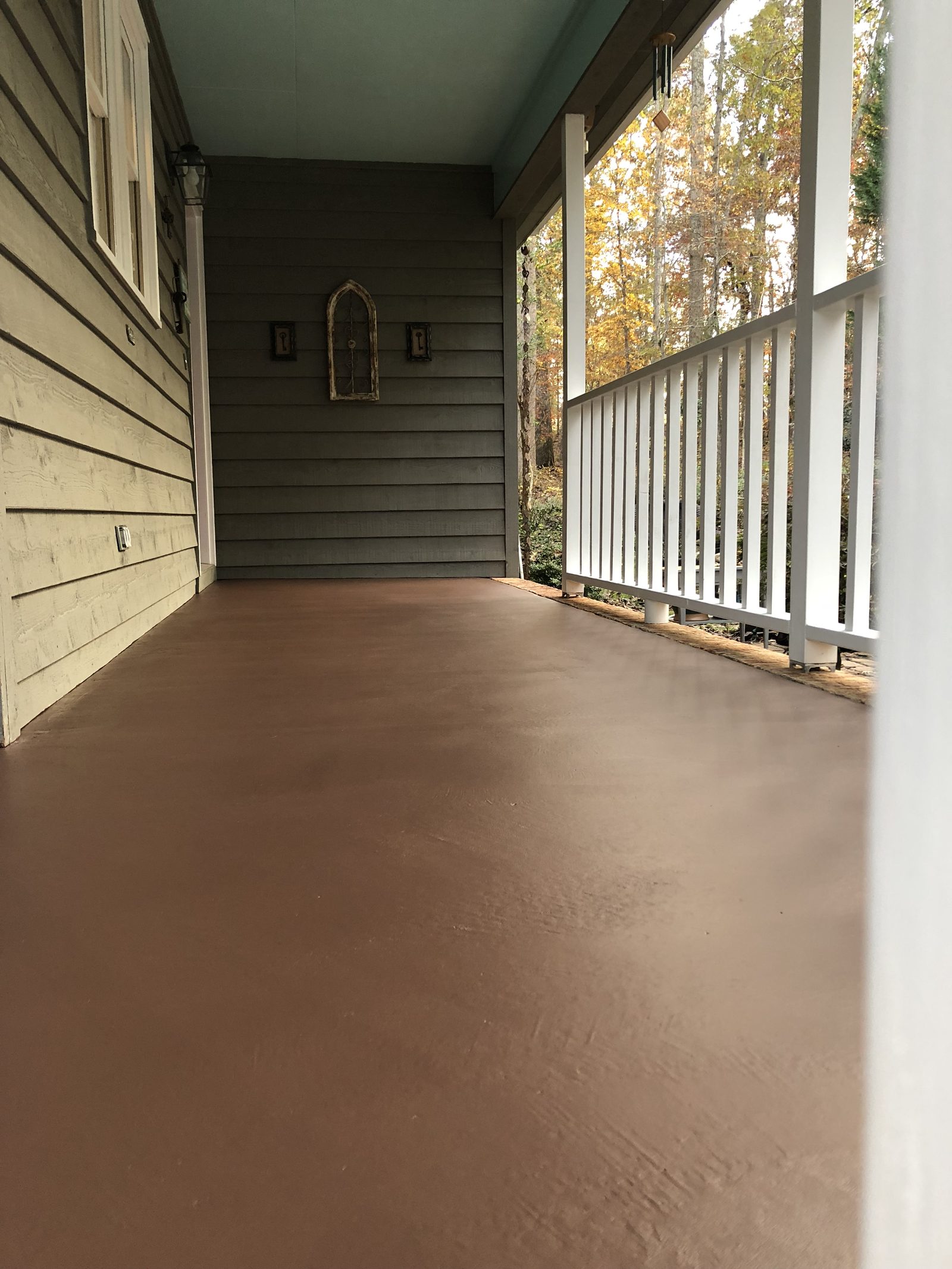 Front porch floor painted with a durable porch and floor coating