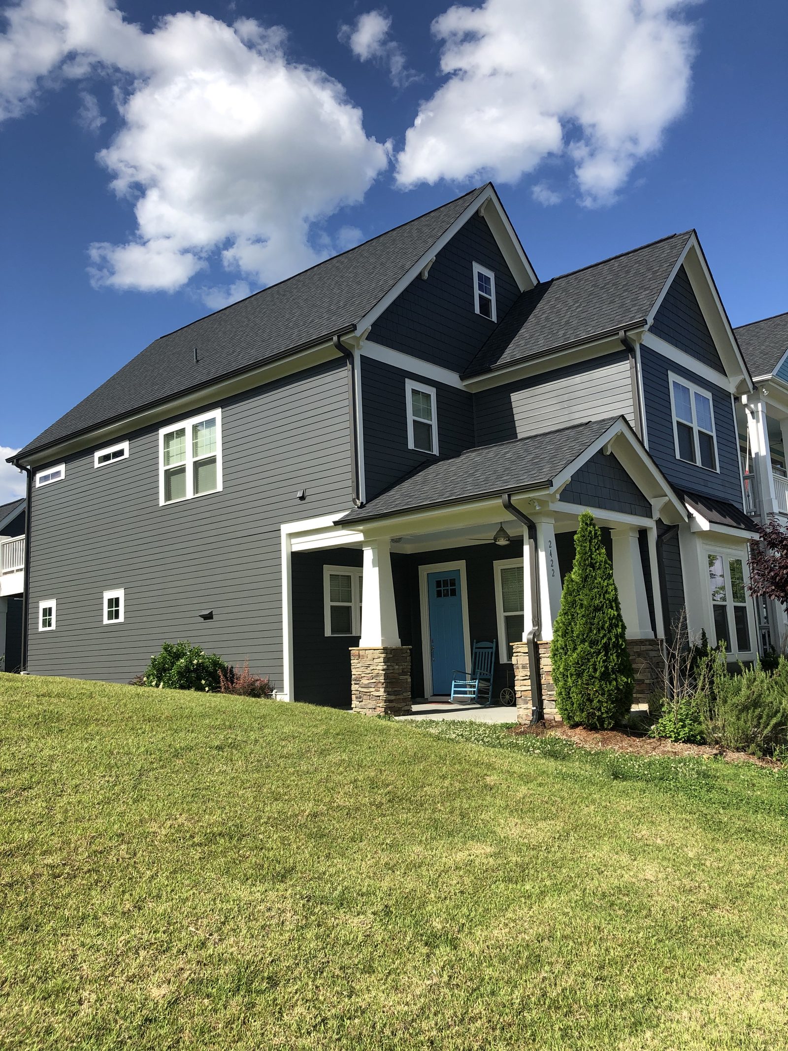 Full exterior siding and trim painted on a Chapel Hill, NC home
