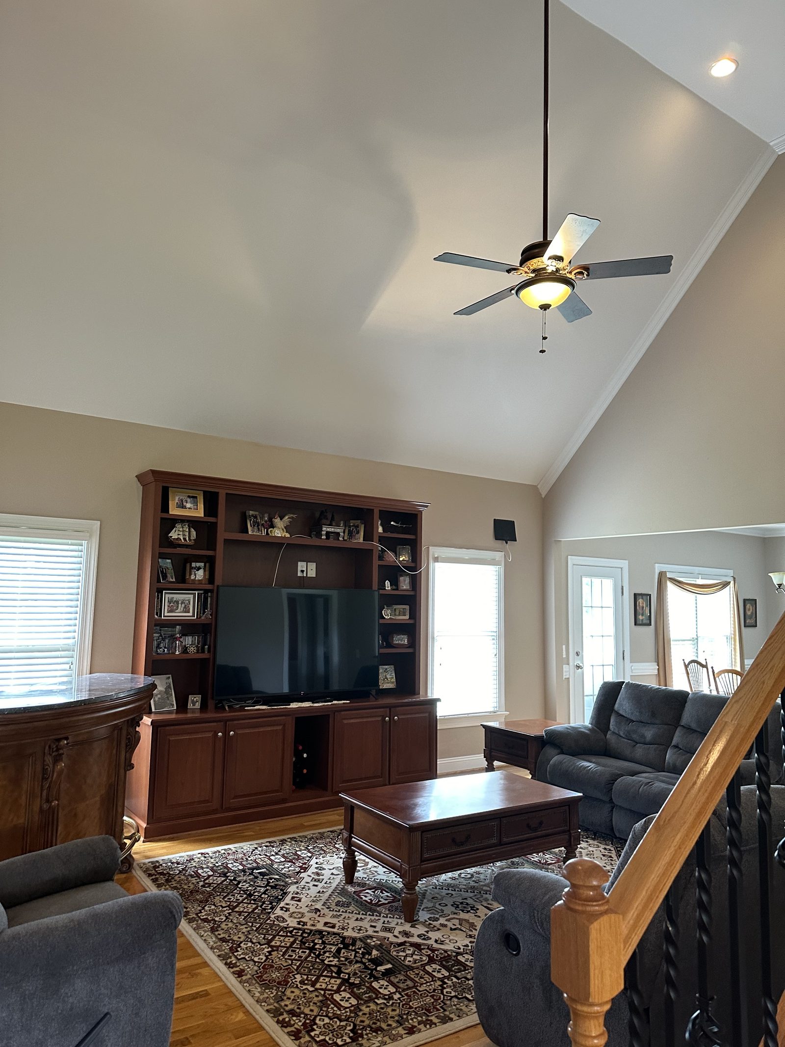 Vaulted living room with freshly painted walls and ceiling